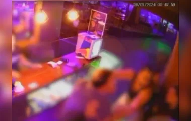 Bombeiro atira na cabeça de mulher durante briga em bar; veja vídeo