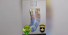  17 pinos de cocaína e R$ 125 em notas foram apreendidos pela polícia 