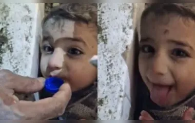 Cena emocionante do menino sírio recebendo água