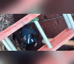 Mulher cai em fossa de quatro metros após tampa ceder na região